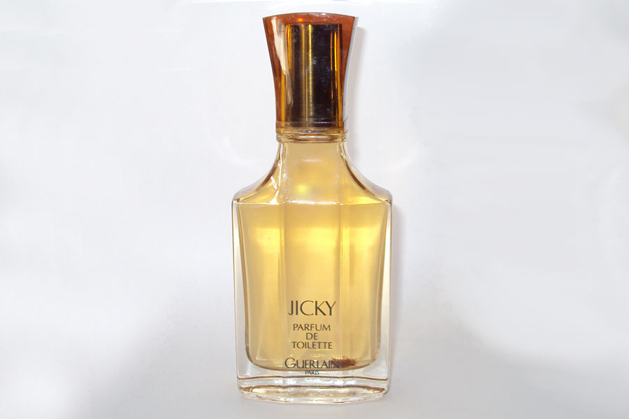 Jicky Flacon du parfum de toilette Factice Bochon en verre et couvre bouchon en plastique de Guerlain 