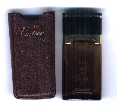 Flacon du parfum Must 15 ml vide pochette en cuir  de Cartier 