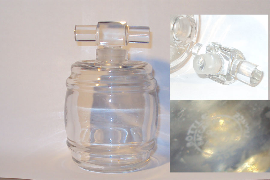 Flacon-tonnelet cristal clair de BACCARAT pour le parfum Pleasure  gravé n] 14 . Sans la décoration or. Parfait état de Caron 