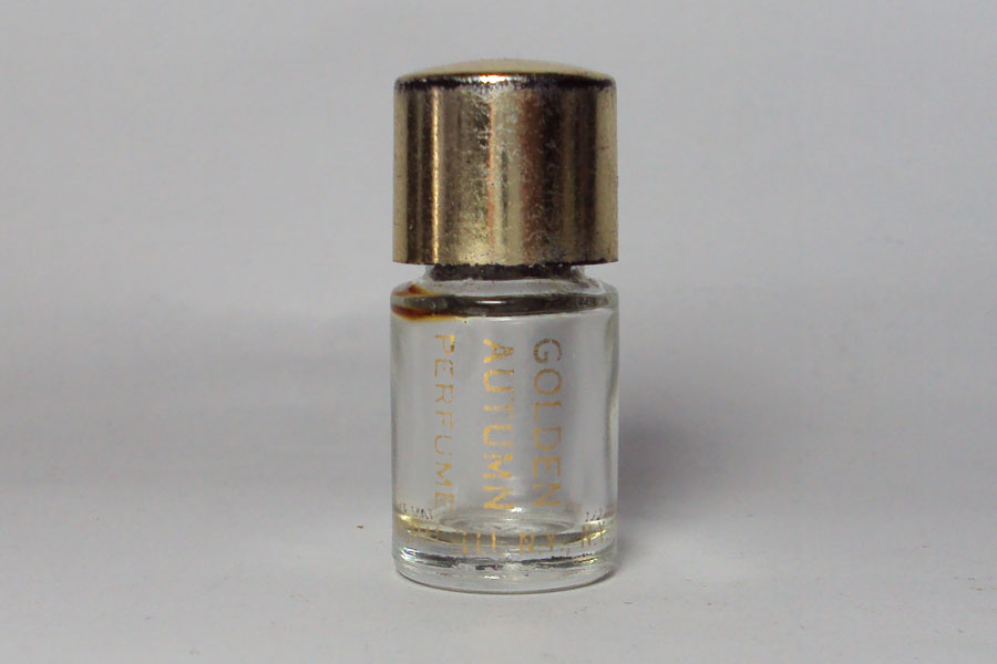 Golden autumn Perfume N.Y. bouchon doré hauteur 3.7 cm sérigraphie dorée très légérement passée  de Matchabelli 