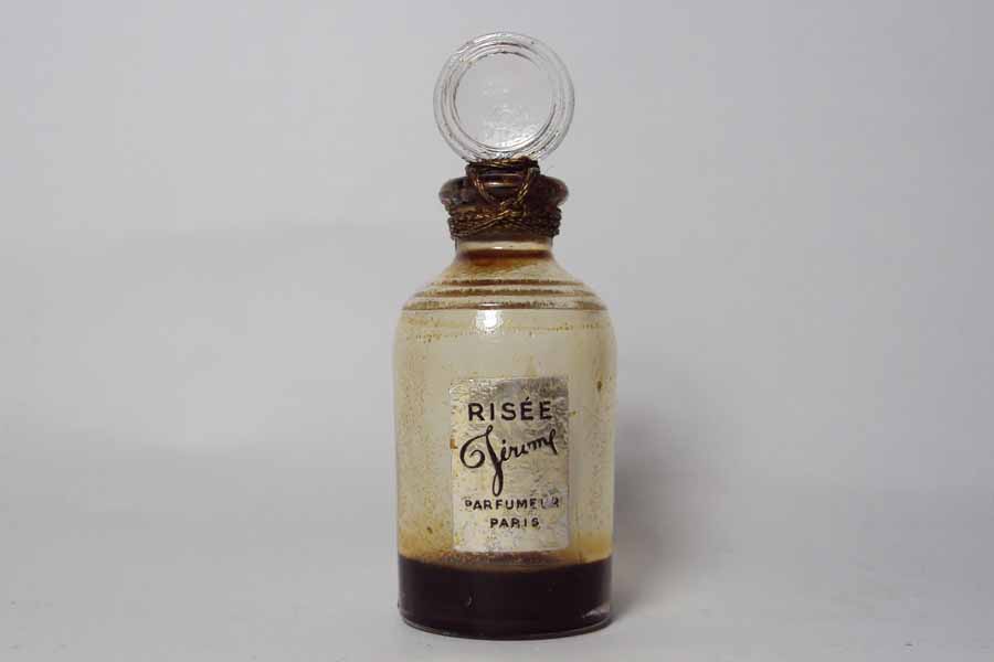 Risée Bouchon en verre émeri scellé mais le parfum évaporé Hauteur 5.8 cm étiquette froissée de Jérome 