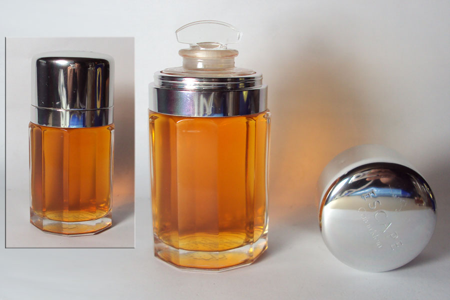 Escape Factice du parfum hauteur 9.3 cm bouchon en verre couvre bouchon en métal légére griffe sur le couvre bouchon  de Klein Calvin 