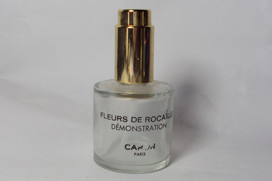 Fleurs De Rocaille Vapo de Démonstration défaut de sérigraphie hauteur 8 cm de Caron 