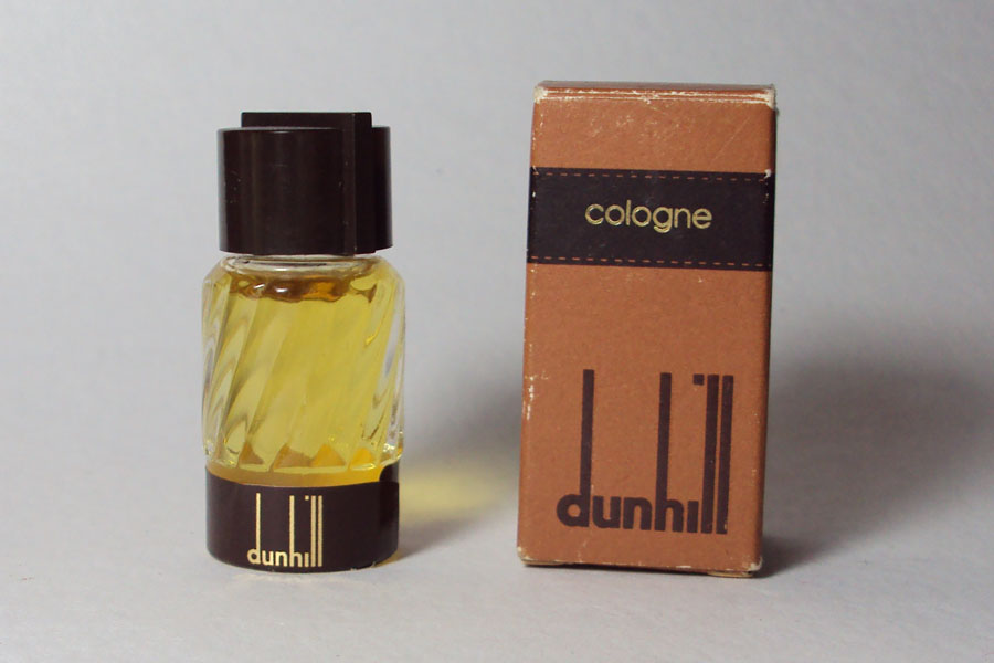 Cologne  Hauteur 4.7 cm boite légèrement usagée plein de Dunhill 