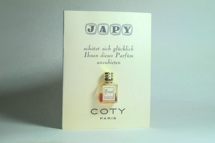 L'Aimant Miniature 1 ml sur carte texte en Flamant  de Coty 